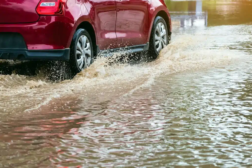 Car driving in flood conditions during a Defensive Driving Course - Gold Coast